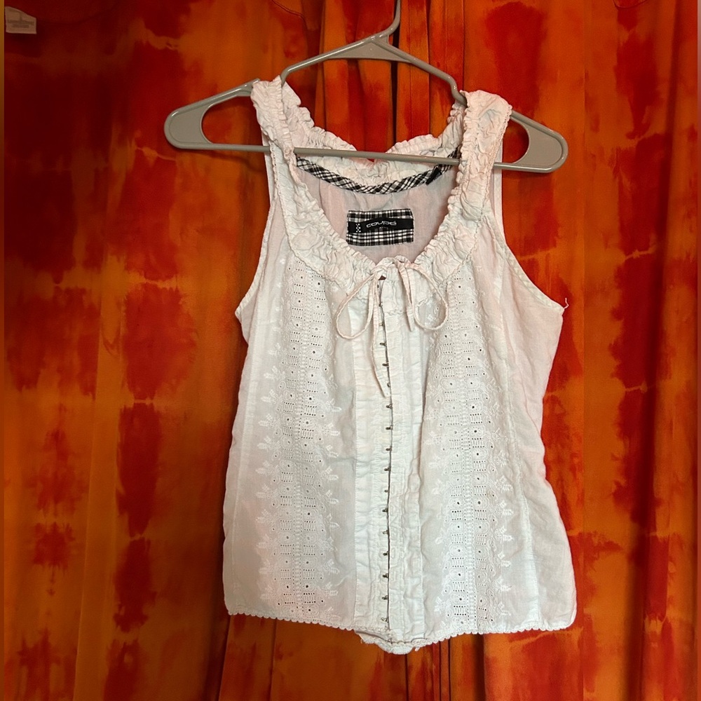 Coupè tank with corset style latches all up the front with front and back ties